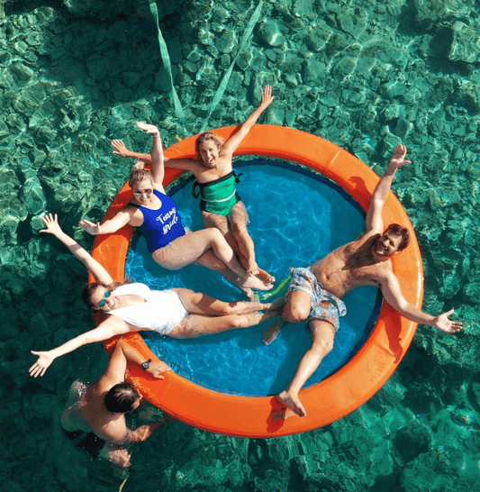 Turn any pool, lake, or river into your personal paradise with the Round Floating Ring Inflatable Water Hammock!